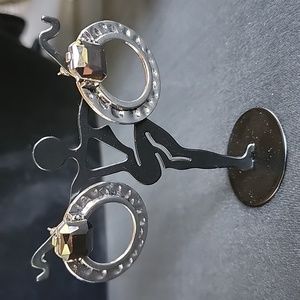 Silver toned earrings with black gem stone